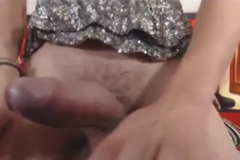 pretty ladyboy Stroking Her massive penis