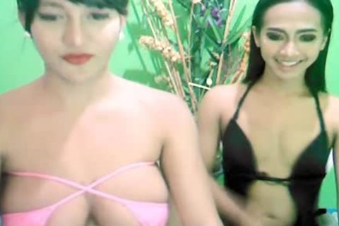 Two nasty oriental tranny likes To poke Each Other