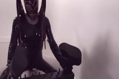 Fetish shemale In Latex Suit And Mask bonks