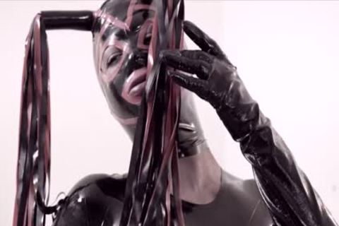 Fetish sheboy In Latex Suit And Mask fucks