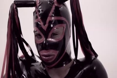 Fetish sheboy In Latex Suit And Mask fucks
