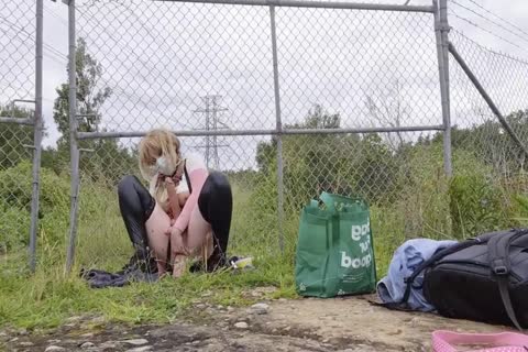 shemale Sissy Wearing A strapon And Riding Dildos In Public