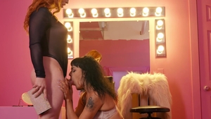 TransAngels.com: Transsexual Evie Envy wearing suit doggy