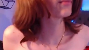 Redhead Transgirl In dark nylons Shows Off Her Little Butte