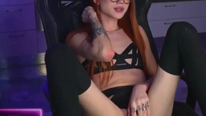Redhead Skinny Russian Tattooed ladyman In Glasses Strokes Her Girly cock On webcam