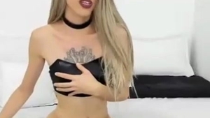 Petite Colombian tranny With Tattoos Strokes Her cock On webcam